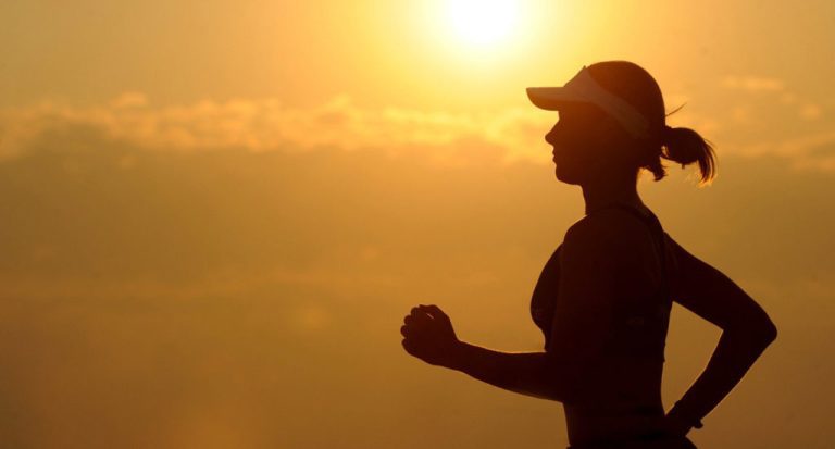 Person jogging outdoors after LASIK surgery.