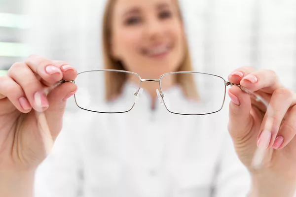 A doctor explaining LASIK surgery options to a patient.